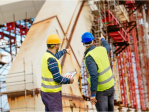 Two construction workers on the building site